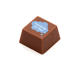 Image of A square shaped chocolate, with the message